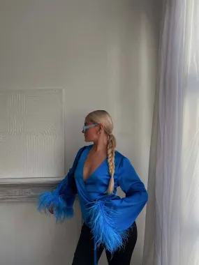Glamorous Blue Aster Satin Wrap Blouse with Feather Trim